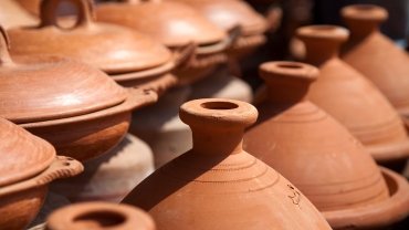 Explore the artistry of pottery in Amizmiz, Morocco. Uncover handmade Berber ceramics, buying tips, and cultural stories. Start your clay adventure!