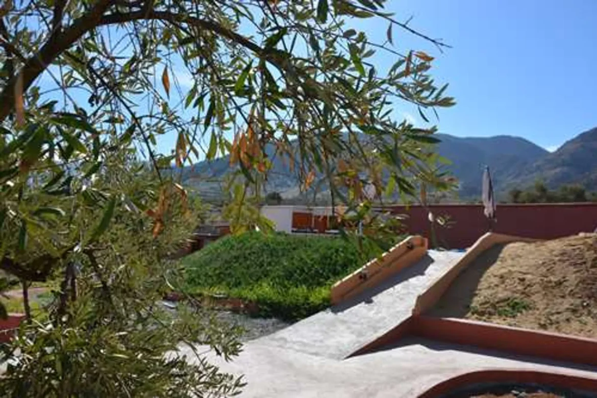 Discover Atlas Ecosite, a sustainable mountain retreat in Amizmiz. Stay in eco-friendly rooms or Saharan tents at 1200m altitude with stunning views.